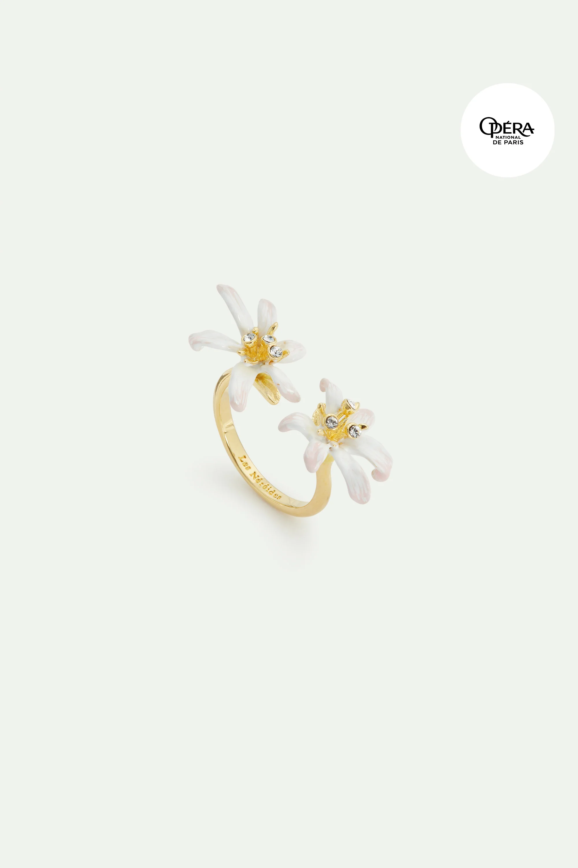 Bague ajustable dorée Fleur de Lys blanche