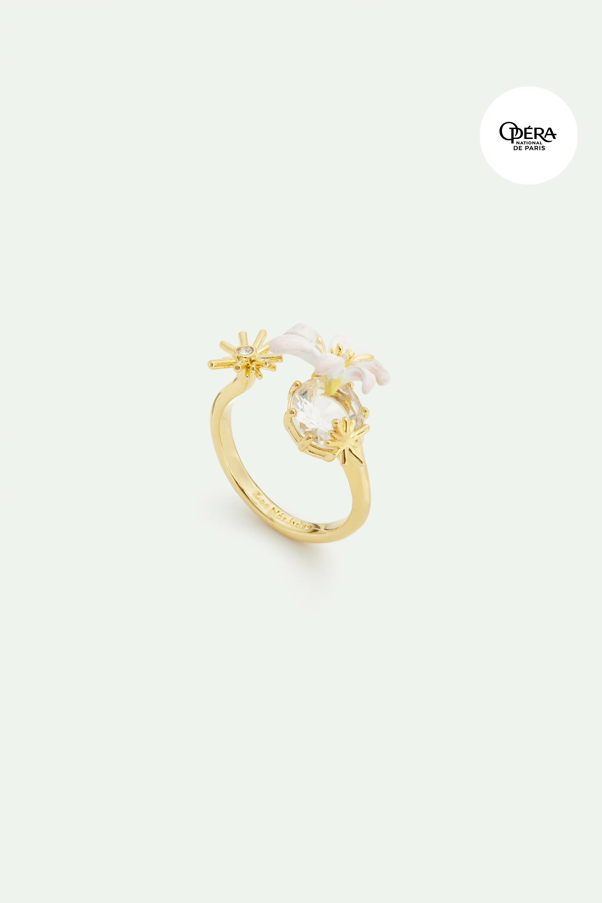Bague ajustable dorée Fleur de Lys blanche et pierre facettée