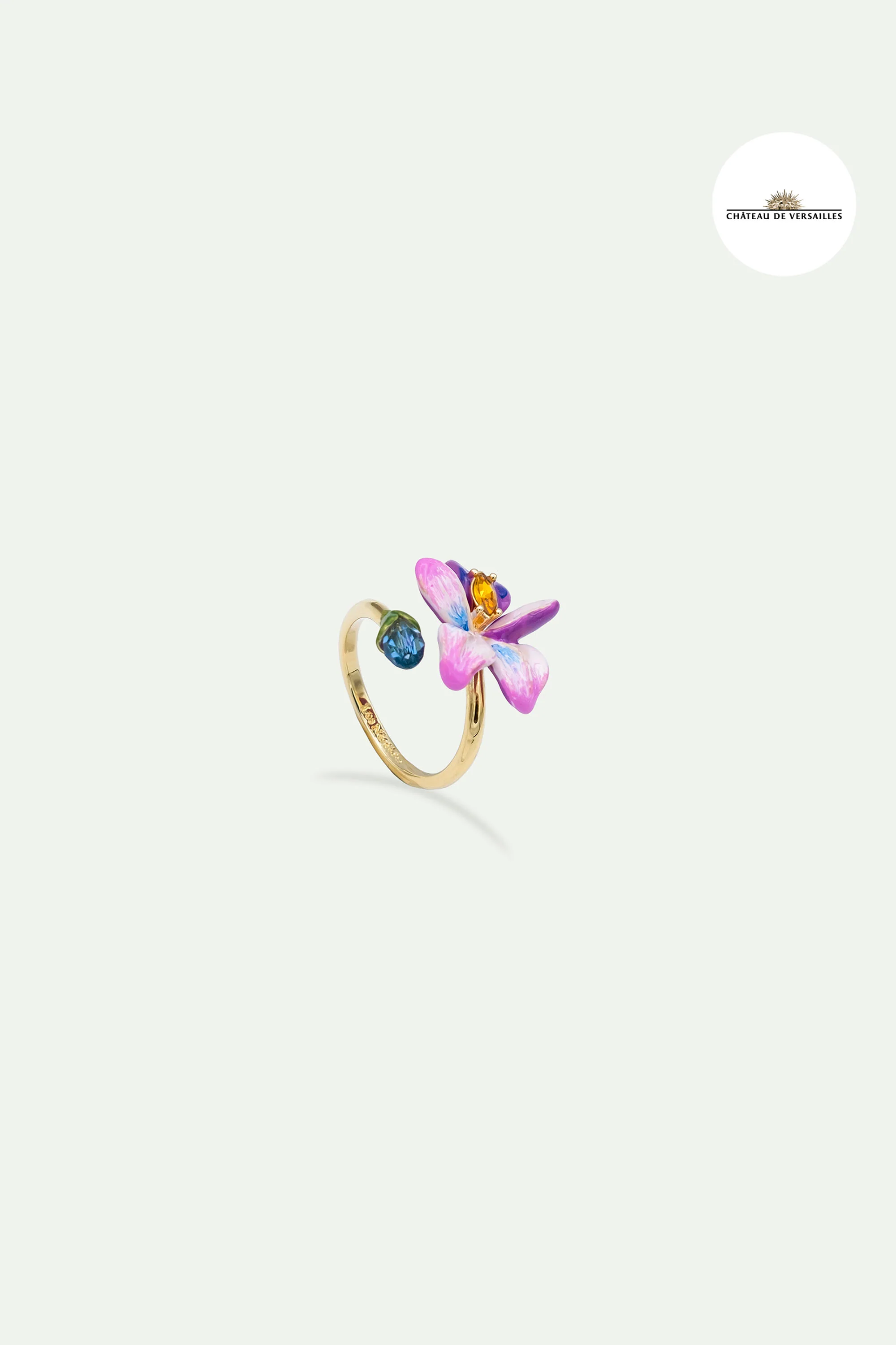 Bague ajustable fleur de violette et pierre taillée bleue