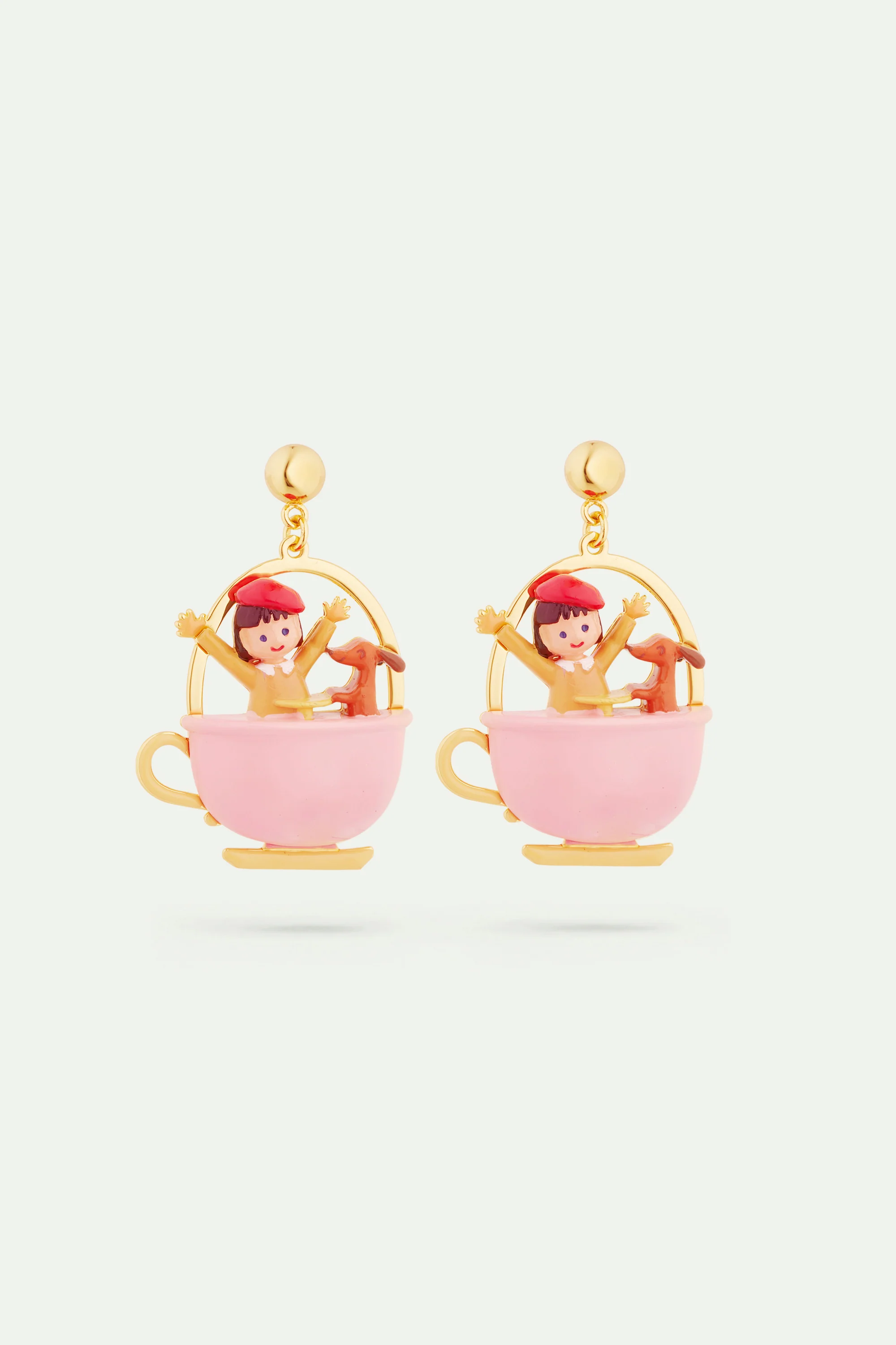 Boucles d'oreilles petite fille et teckel sur un manège