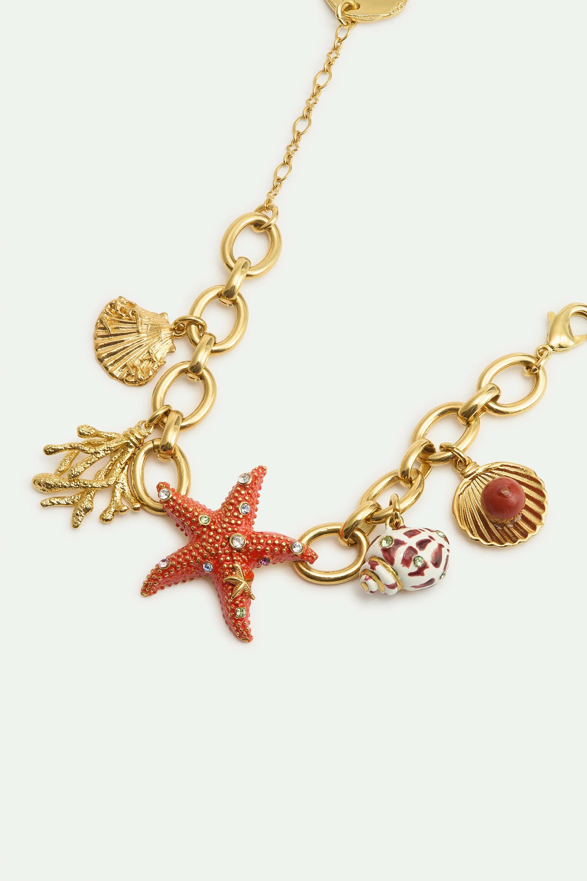 Bracelet doré étoile de mer et pendentifs coquillages - Image 3