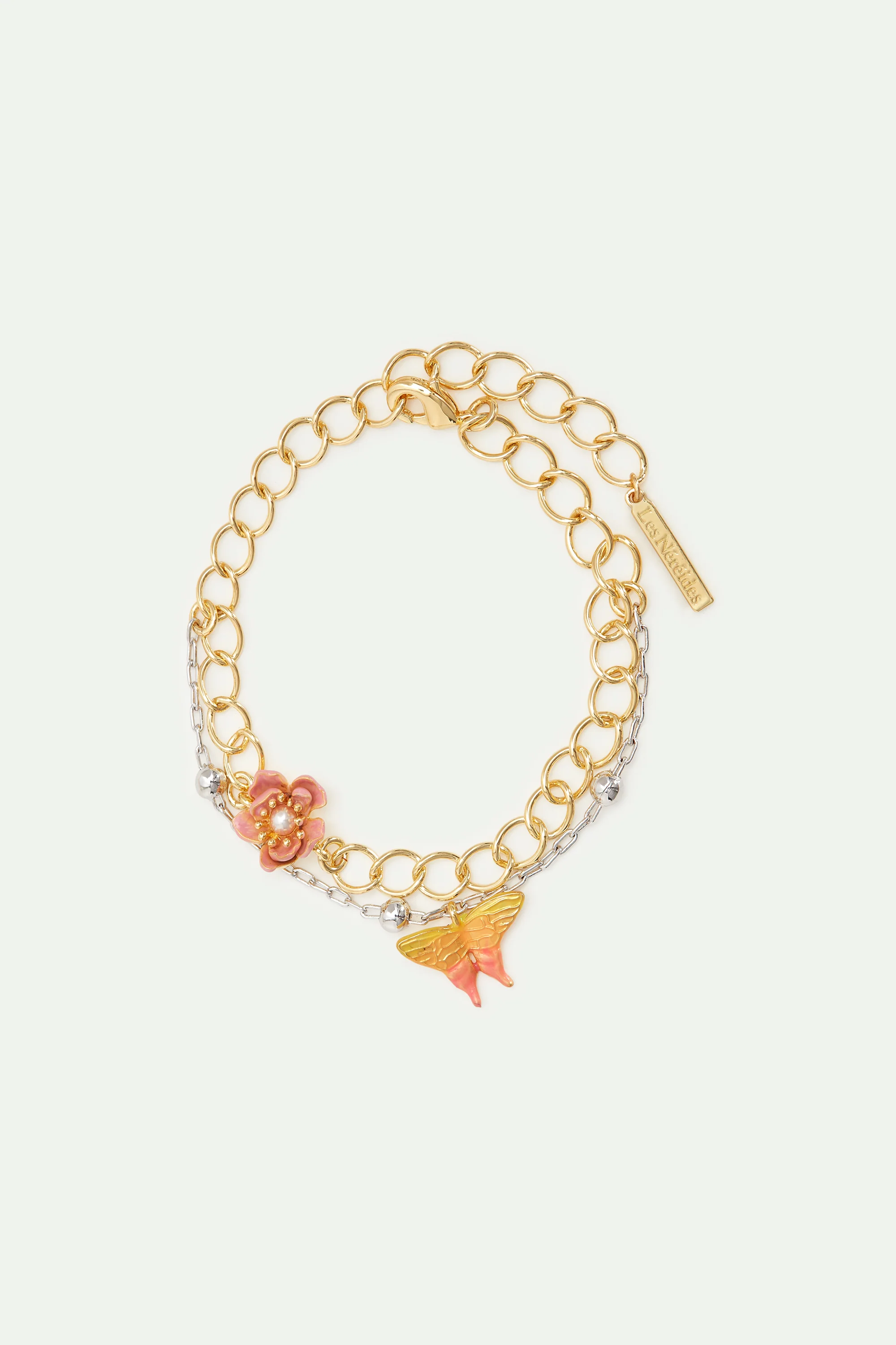 Bracelet double chaine bicolore, fleur de magnolia et papillon