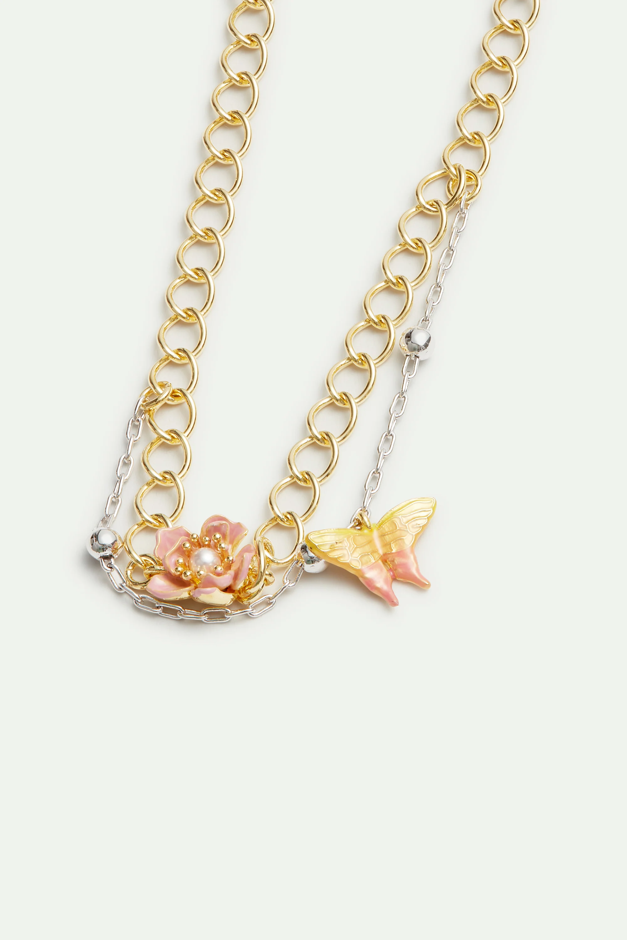 Bracelet double chaine bicolore, fleur de magnolia et papillon - Image 2