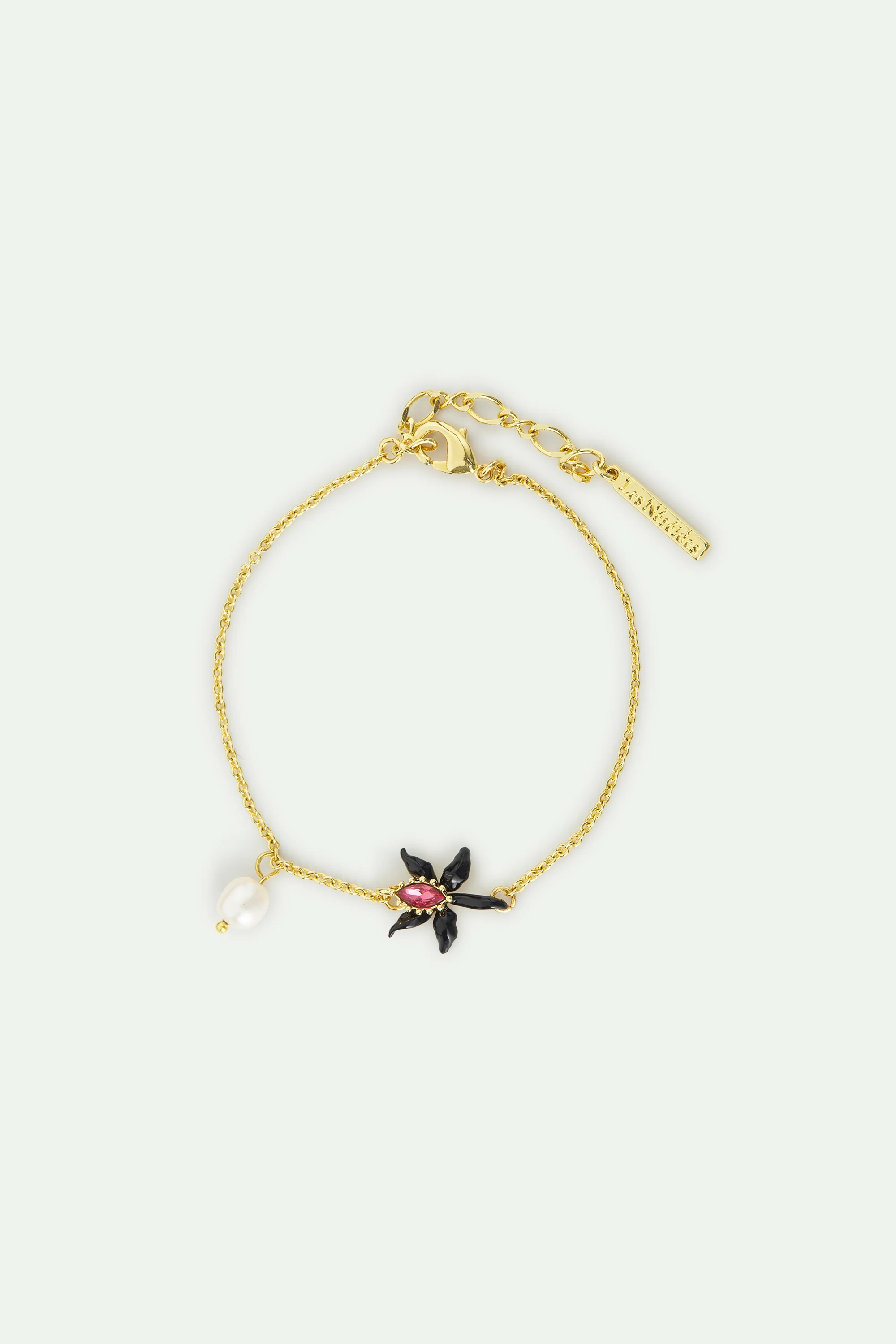 Bracelet fin orchidée noire, cristal facetté rose et perle de culture.
