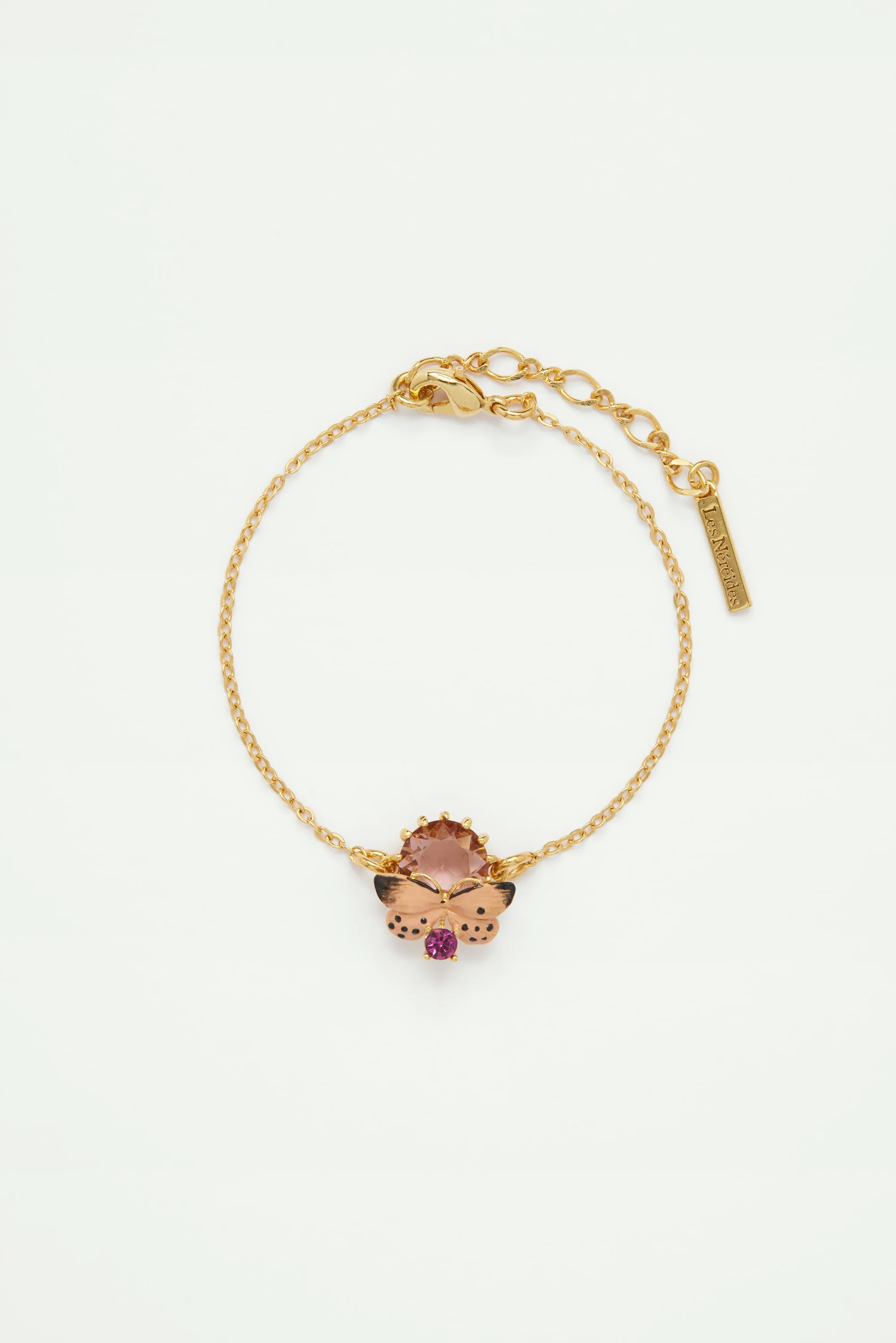 Bracelet fin papillon blanc et pierres rondes