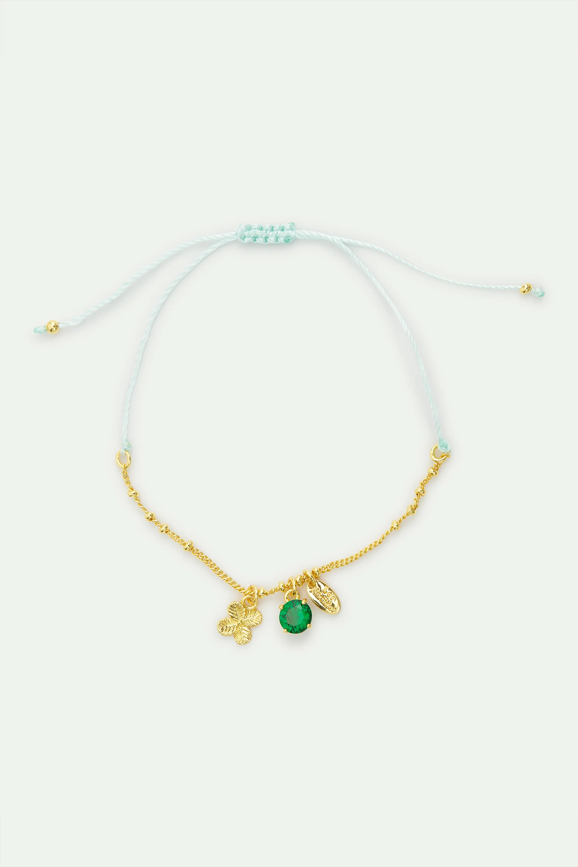 Bracelet fin pendentif trèfle doré et cristal facetté vert