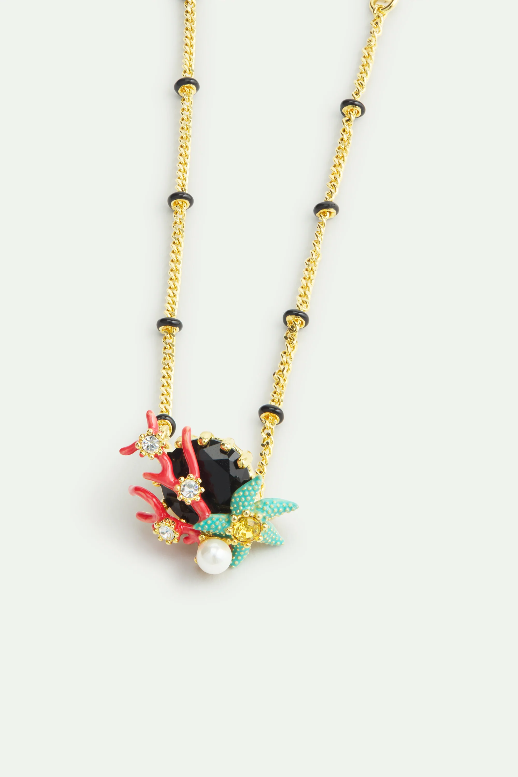 Bracelet fin pierre ronde facettée noire, corail rouge, étoile de mer bleue et perle de culture - Image 2