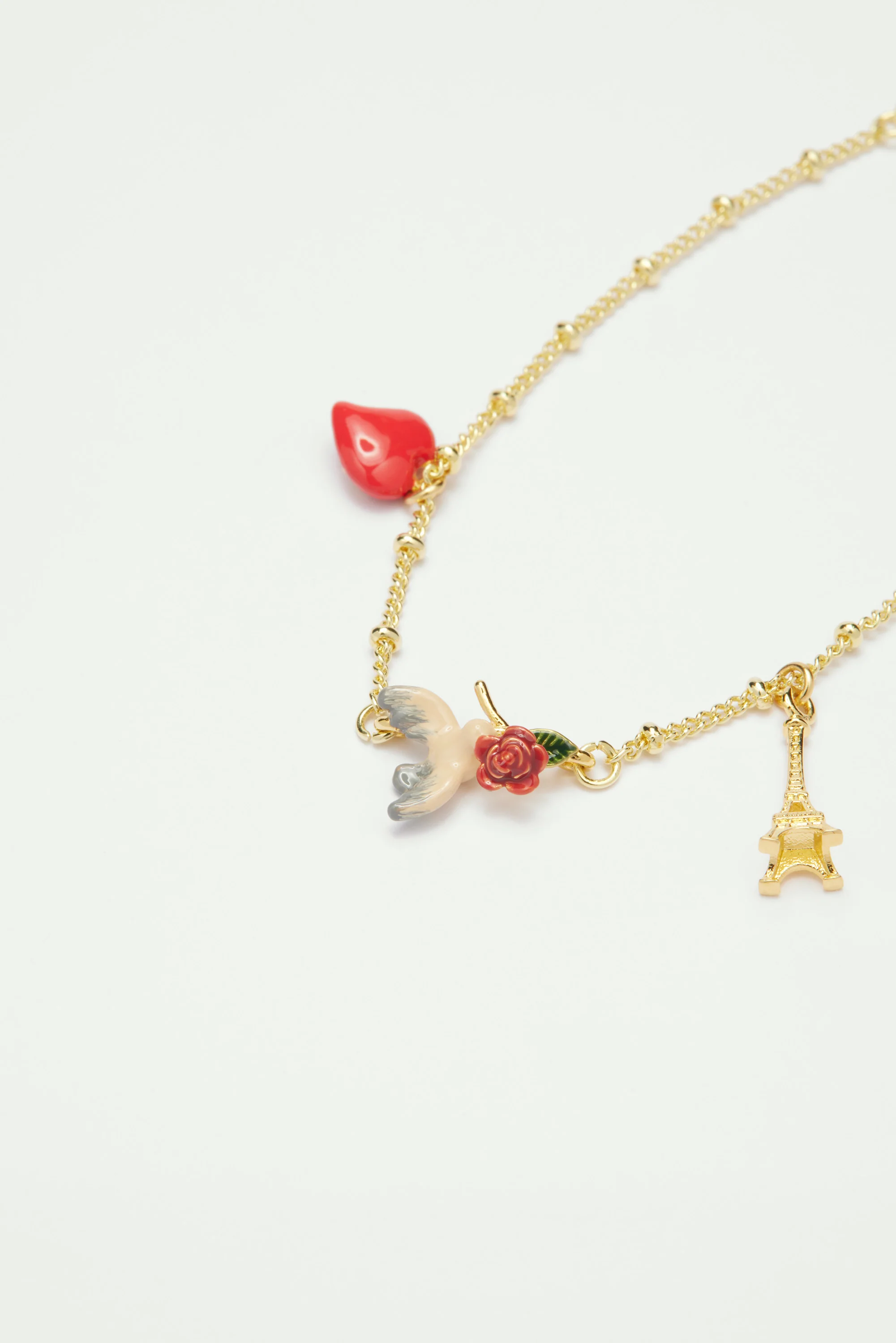 Bracelet fin Tour Eiffel, coeur, moineau et rose - Image 3
