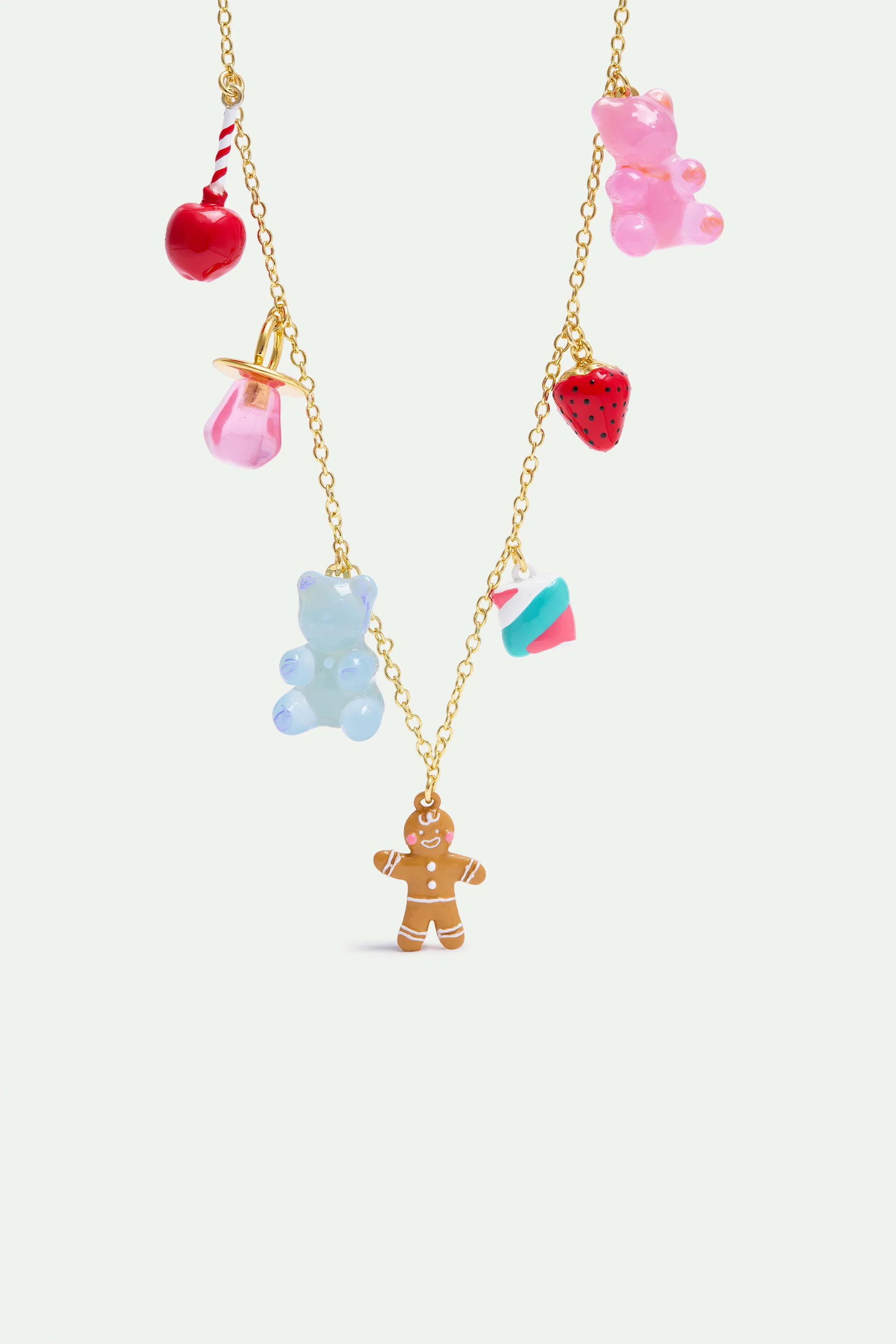 Collier pendentif bohnomme en pain d'épices, oursons en guimauve, sucette et fraise