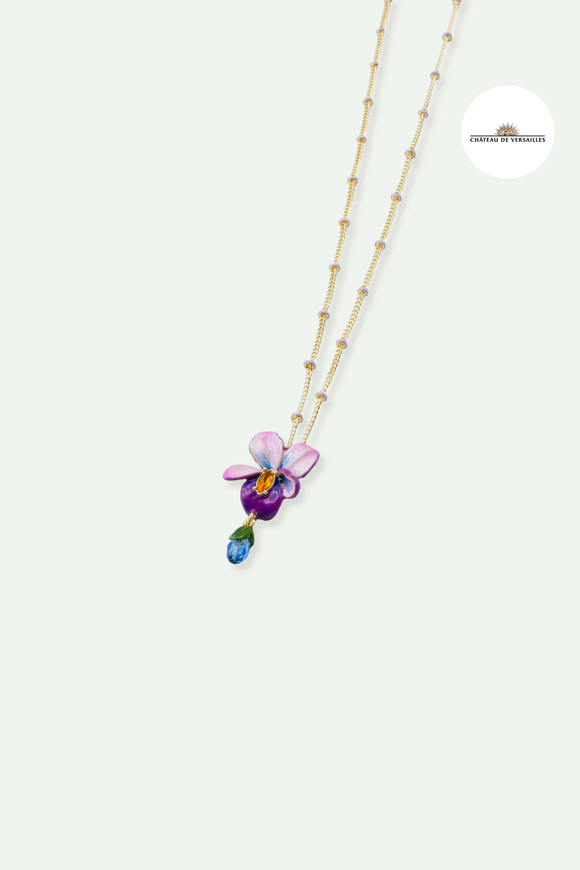 Collier pendentif chaine perlée fleur de violette et pierre bleue pendante