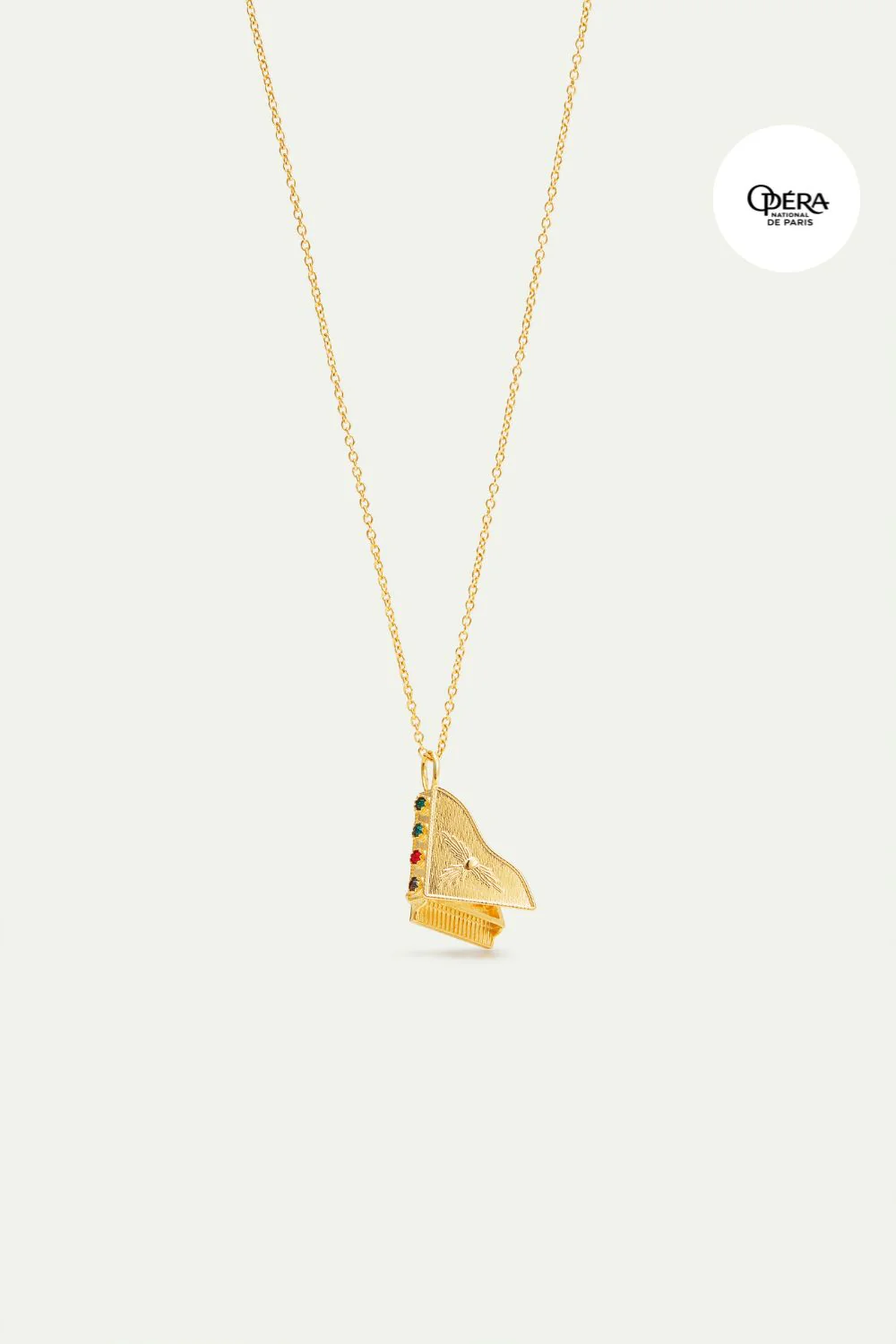 Collier pendentif piano doré